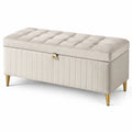 Panca contenitore in velluto beige con gambe in metallo